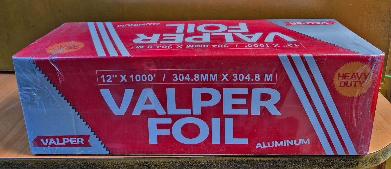 Papel aluminio 12" x 304 mts c/roja heavy duty (14 micras)