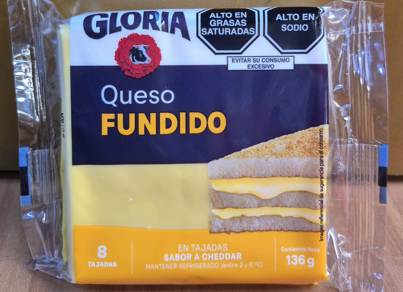 Gloria queso fundido sabor cheddar x 8 taj 136 gr